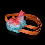 Vibrations-Toy mit braunen Trageriemen und Metallring, blau-rot schattiert