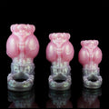 Pink knot cock rings with ball ring in three sizes, side-by-side