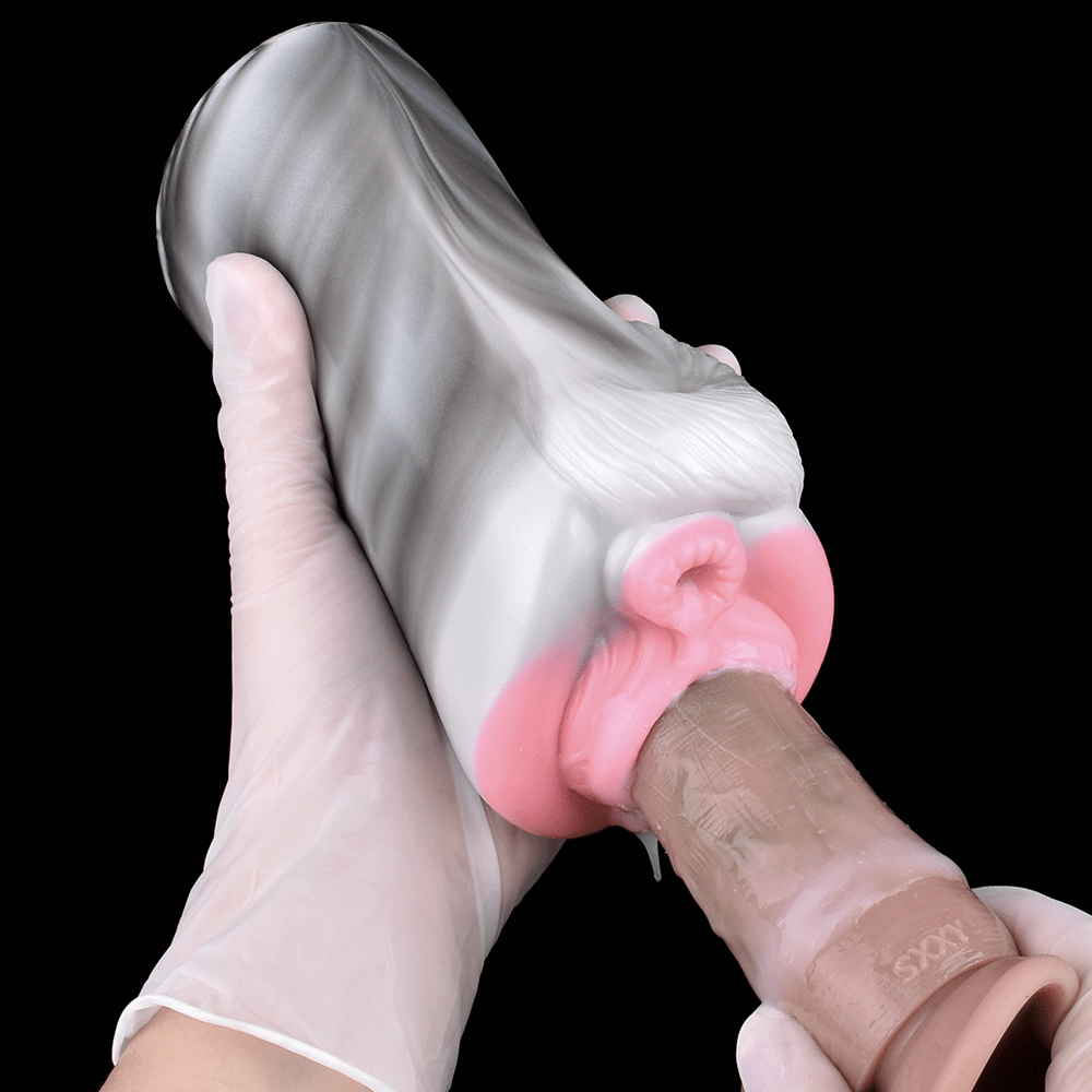 Pony animal masturbator in hand, white sleeve with pink tip and opening