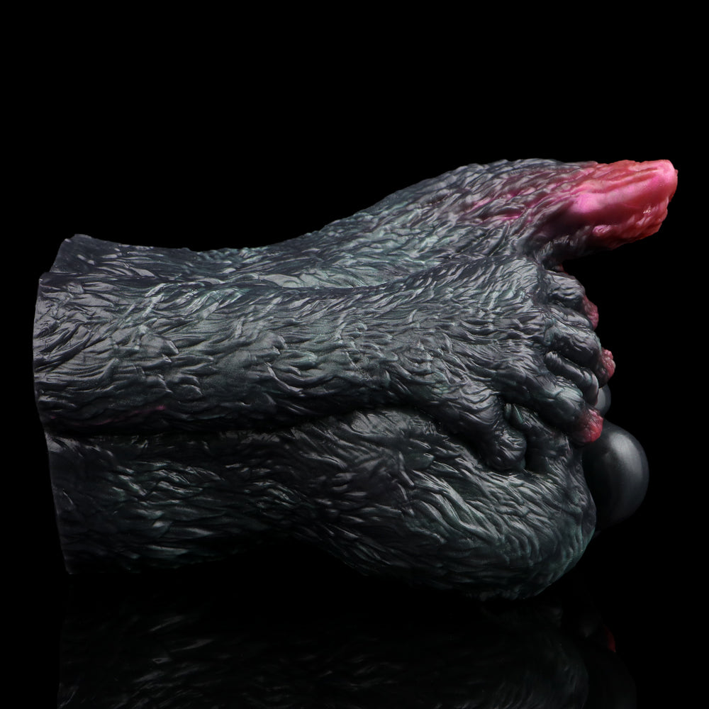 Close-up side of textured dragon-cat body with pink inner opening near rim