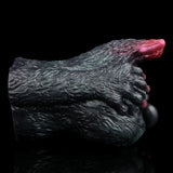 Close-up side of textured dragon-cat body with pink inner opening near rim