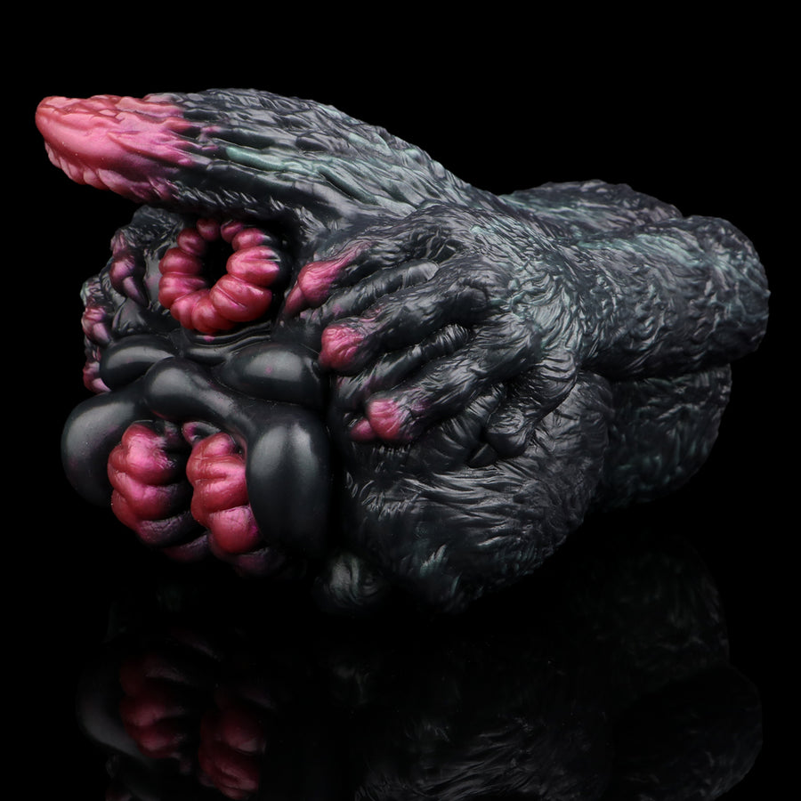 Cat-shaped giant masturbator with exposed pink inner parts and dual openings on dark body