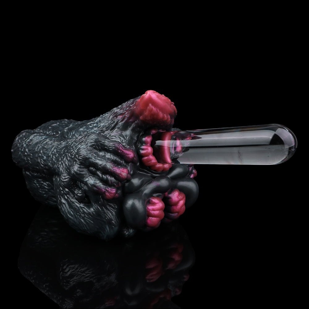 Side view of dragon cat masturbator with dual pink openings and clear sleeve tip