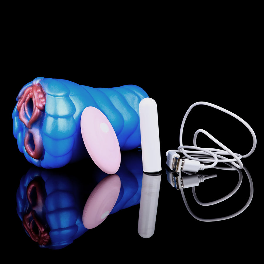 Two-hole dragon-shaped vibrator sleeve, blue with pink inner openings and white plug