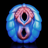 Dragon head design on blue fleshlight with two openings and pink interior
