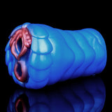 Blue two-hole dragon fleshlight with pink openings on side view