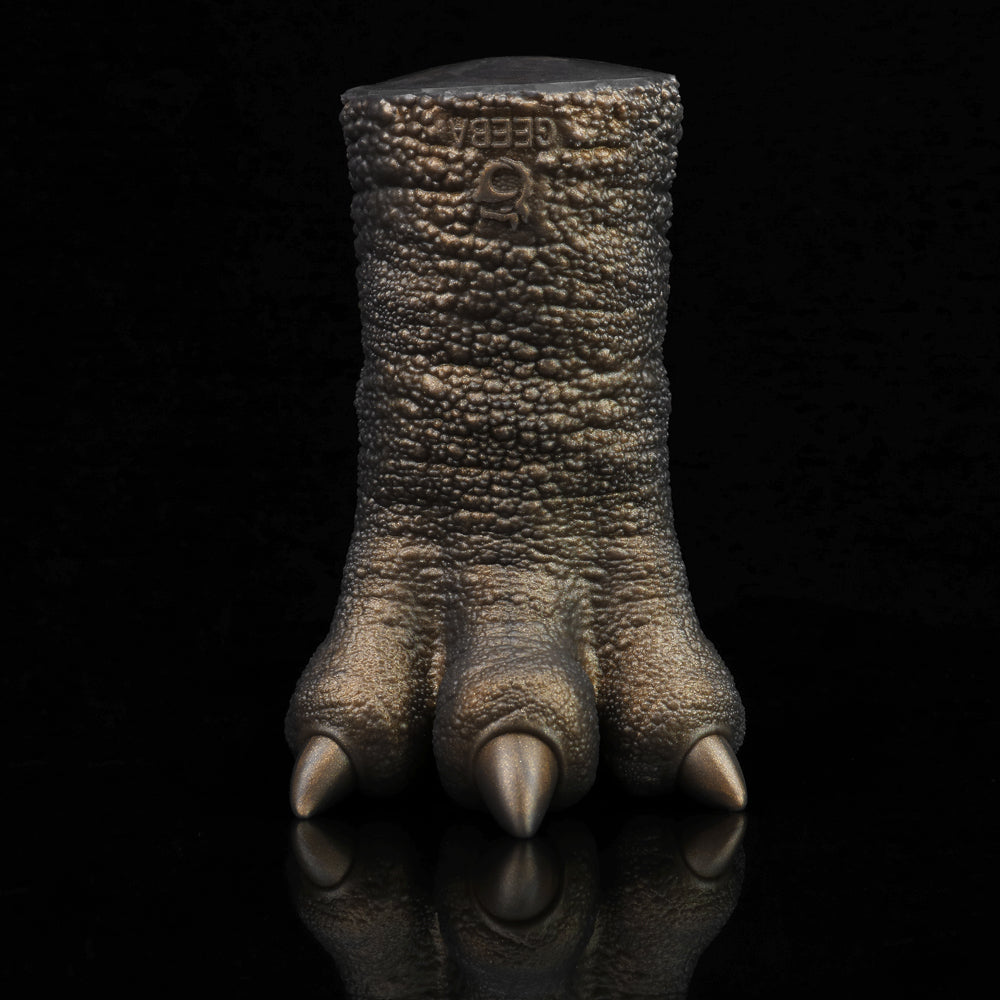 Bronze textured clawed hand with three finger points and thick knuckles