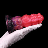 Fantasy-Anal-Dildo: roter Körper mit lila Muster, breiter Flansch, gerippte Oberfläche