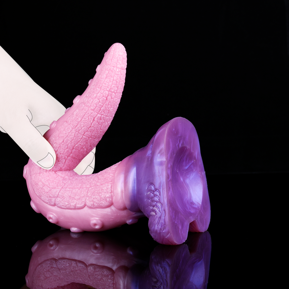 Pink tentacle dildo with suction-bump texture and thick rounded end; curved body.