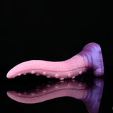 Curved dildo side view with tentacle bumps along textured shaft and bulb base.
