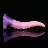 Horizontal tentacle dildo with textured shaft, suction bumps, and flared base for grip.