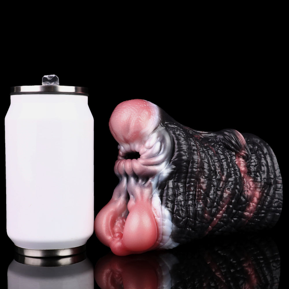 Elefant-Fantasy-Masturbator neben Fläschchen, gerippte Oberfläche und rosafarbene Details