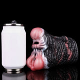 Elefant-Fantasy-Masturbator neben Fläschchen, gerippte Oberfläche und rosafarbene Details