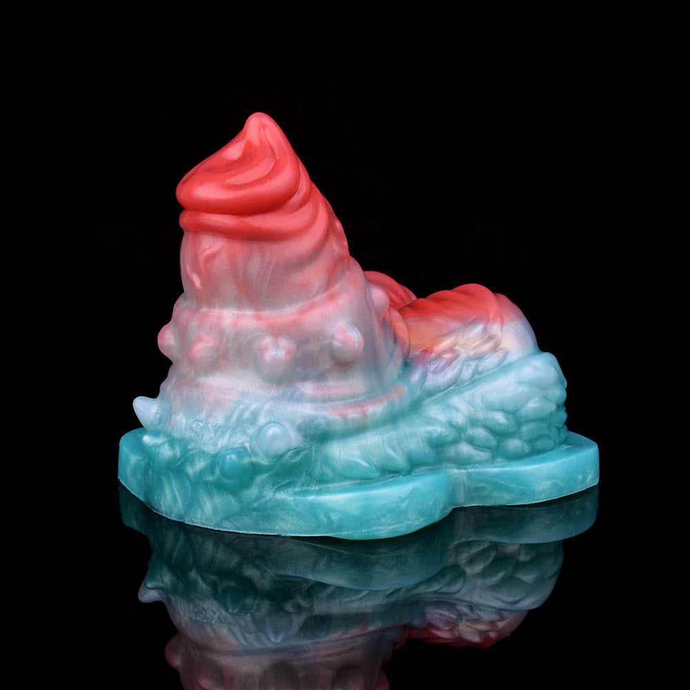Vibrating grinder sex toy, red-tipped top and blue swirl base