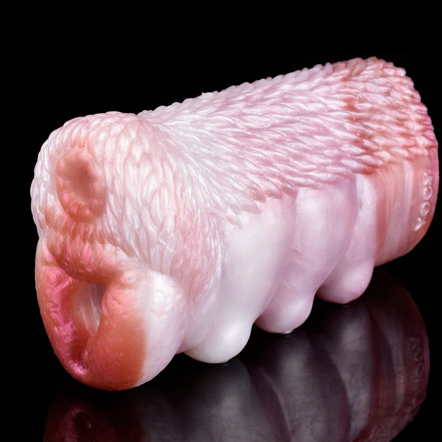 Realistic pink dog-shaped sex toy with textured ridges and rounded head
