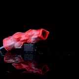 Red/white knot sheath extender with open end over reflective puddle