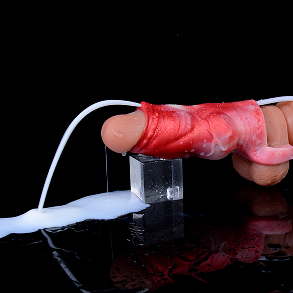 Platinum squirting knot sheath with red textured sleeve and glans, water stream