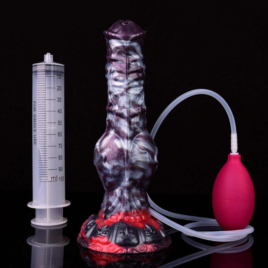 Purple fantasy squirting dildo with red knot base, white tube, pink bulb and syringe