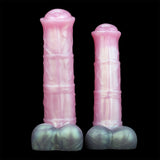 Two upright pink sheath pieces with iridescent rounded hooves