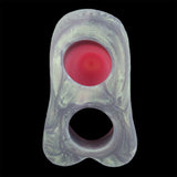 Close-up of iridescent forked base opening with red inner insert