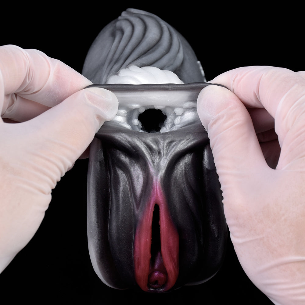 Front view of two-hole horse stroker, gray surface, pink inner folds