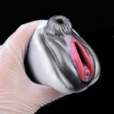 Equinox Stallion masturbator: metallic gray horse head with two pink openings