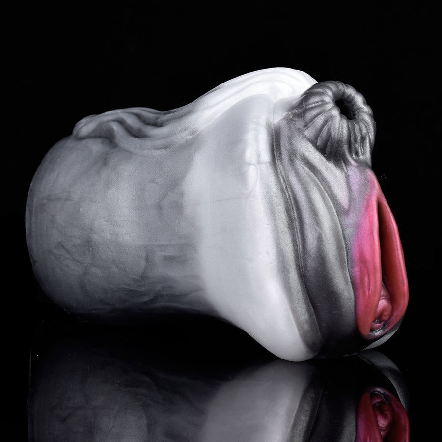 Realistic horse-shaped two-hole stroker, side view with open inlet and light gray body