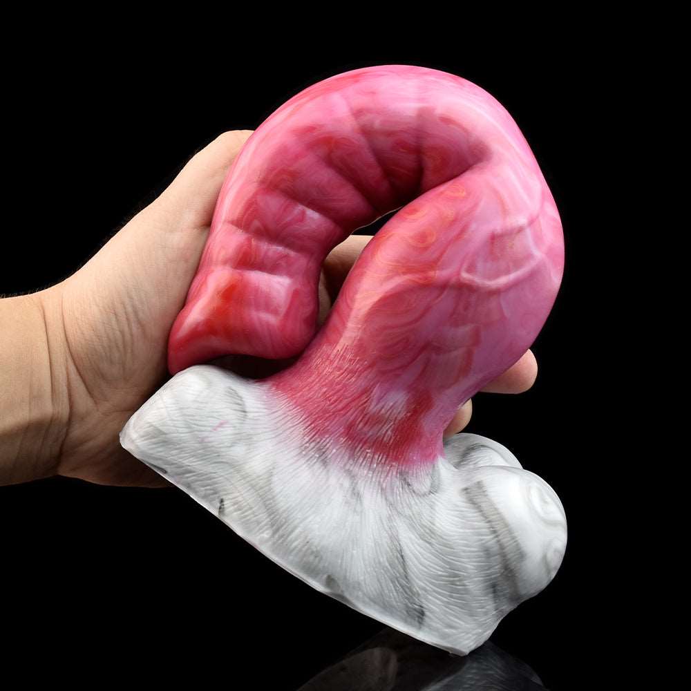 Hand-holding wolf vibrator, curved pink body with white base and textured pattern