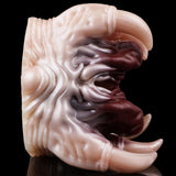 Side view of Facehugger fleshlight with pale outer grippers and maroon inner channel