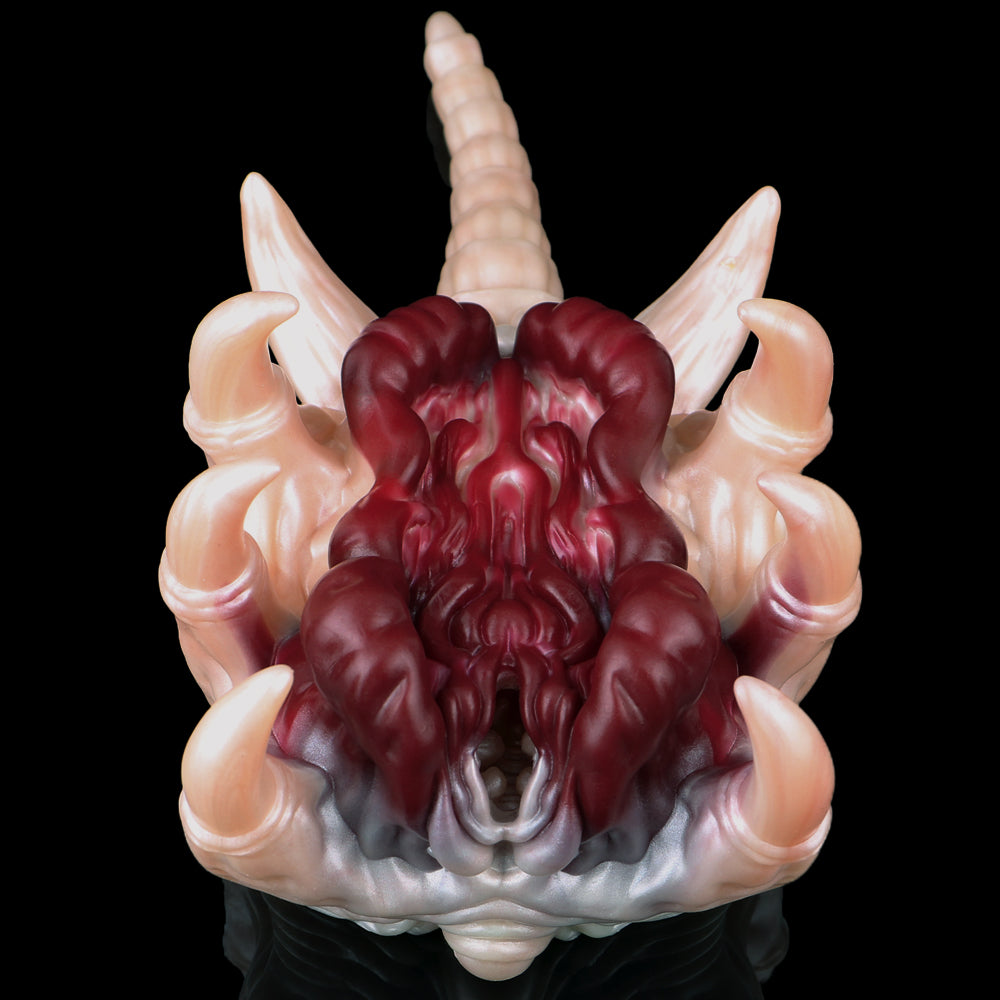 Facehugger fleshlight front view: maroon creature core with pale claw-like tentacle tips