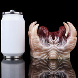 Facehugger fleshlight with pale outer tentacles and maroon ridged inner core