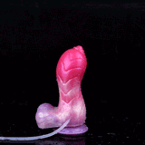 Pink unicorn squirting dildo with round suction cup base and curved nozzle.
