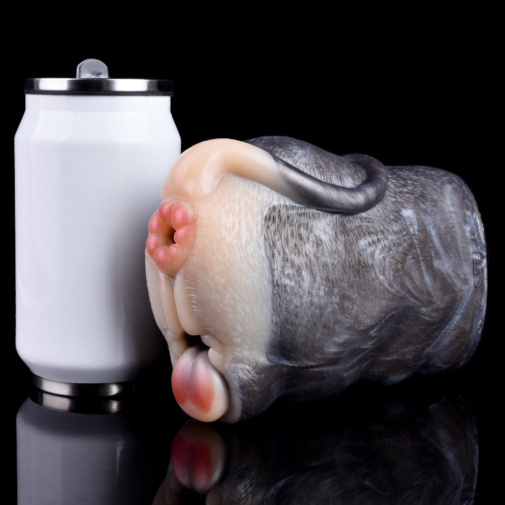 Realistic fawn-shaped silicone stroker with molded pink head details, side view