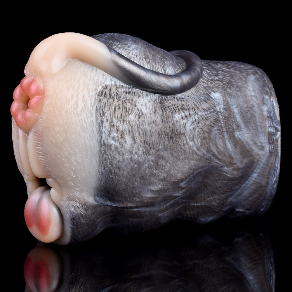 Realistic fawn-shaped silicone stroker with long tail, close-up side angle