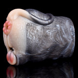 Realistic fawn-shaped silicone stroker with long tail, close-up side angle