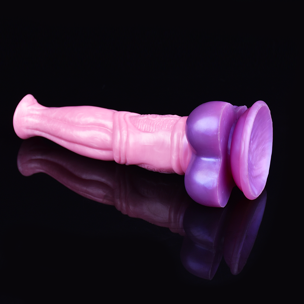 Felix dildo angled view: pink shaft with purple flared base, glossy molded finish.