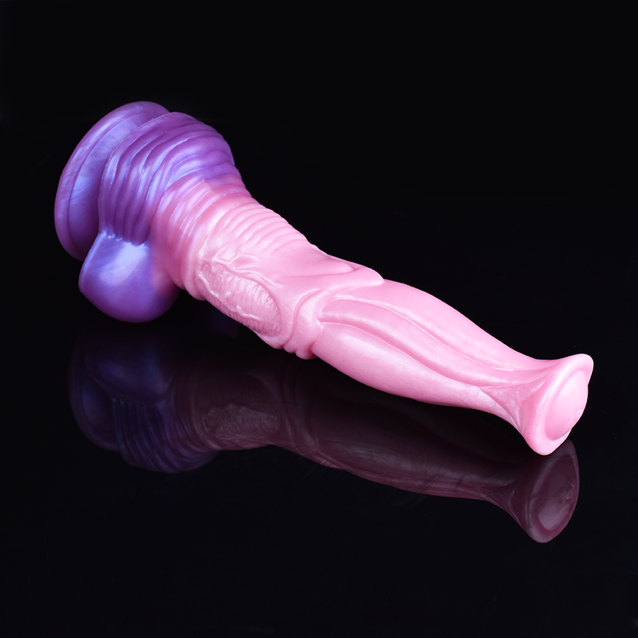 Pink lifelike horse dildo with purple base cap, angled view of smooth tapered tip.
