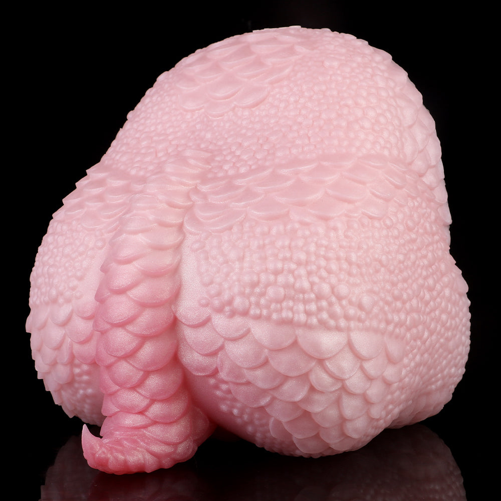 Pink Fleshlight mit schuppenartiger Oberfläche und kugelförmigem Drachenkopf