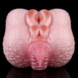 Pink dragon-shaped toy front view with central opening and raised details