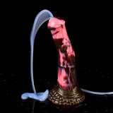 Horse-shaped dildo with white tube spraying fluid; marbled pink/dark and brown base