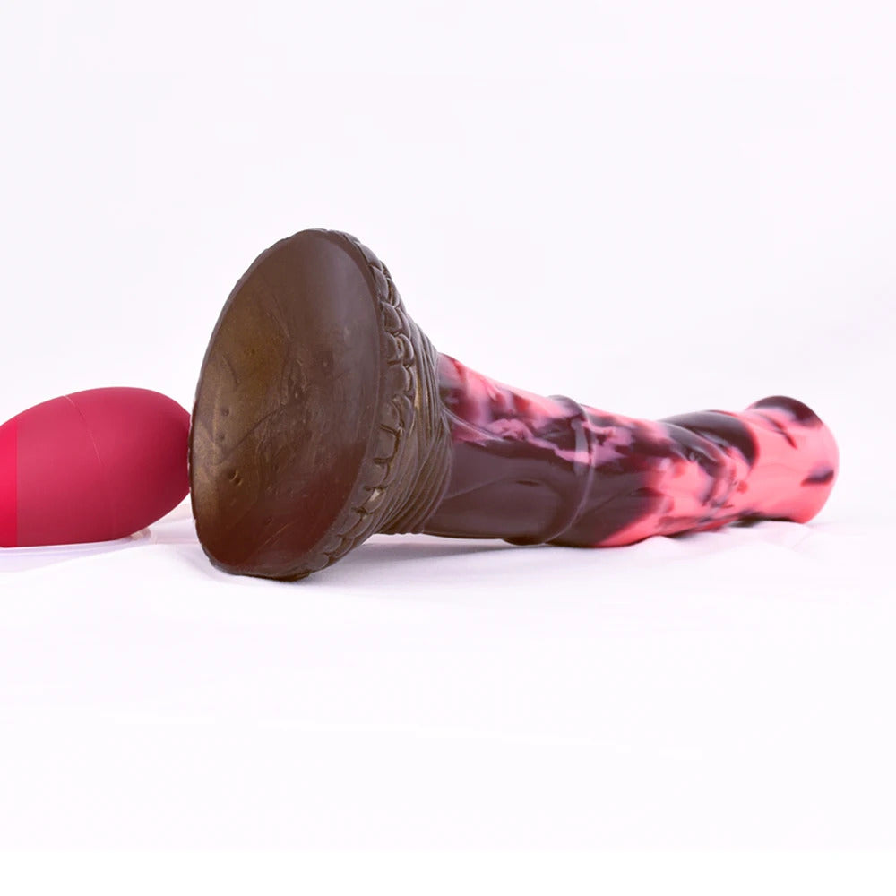 Textured brown base of marbled pink/dark horse dildo with red control bulb