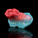 3/4 view of octopus-shaped insert on teal base with glossy reflection