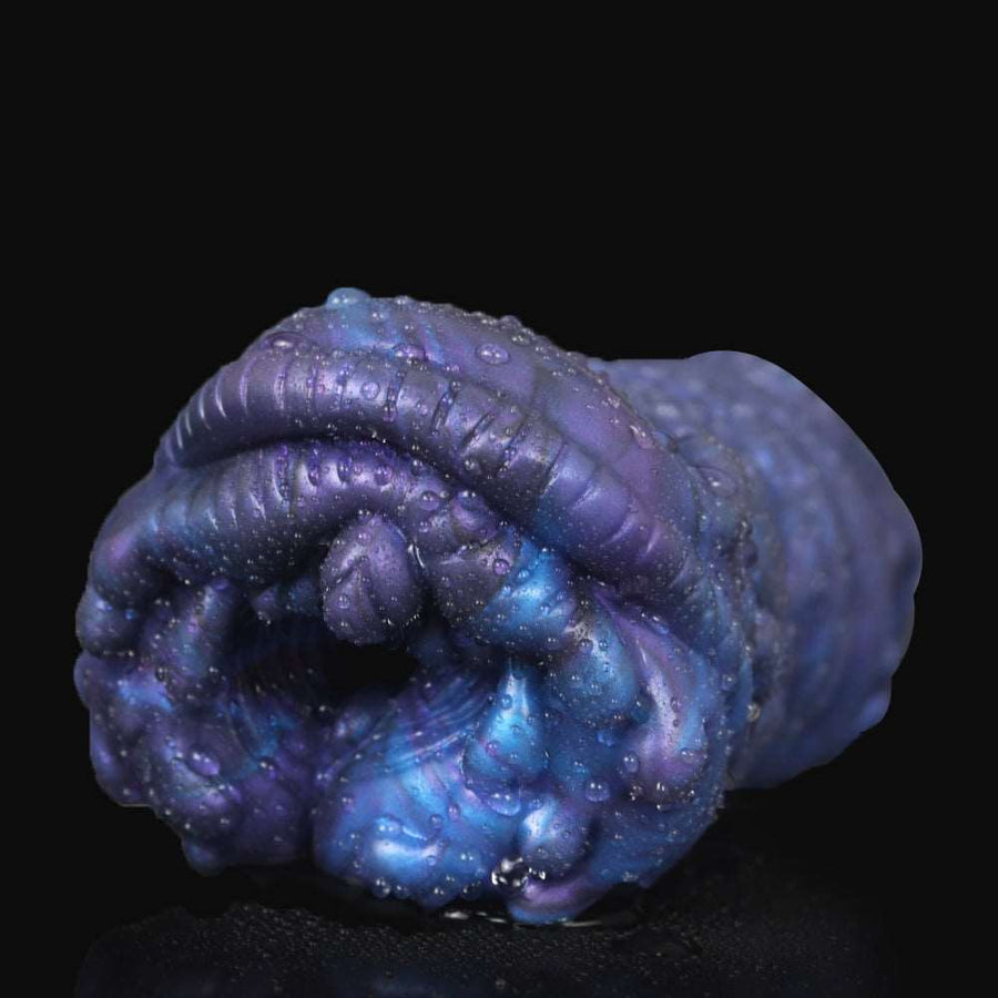 Blue textured male masturbator with curled tip and ribbed surface