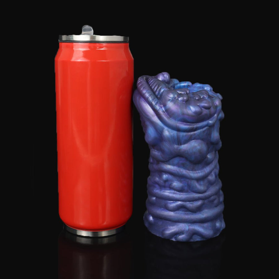 Blue textured male masturbator beside red canister with metal top