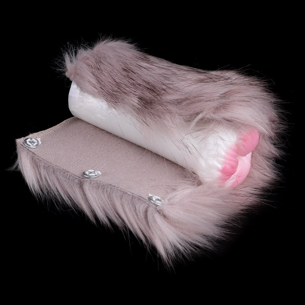 Plush furry masturbator in fabric pouch with buttons; pink inner tip visible
