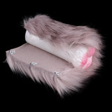 Plush furry masturbator in fabric pouch with buttons; pink inner tip visible