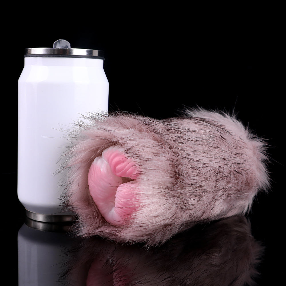 Furry masturbator with plush sleeve beside white bottle accessory