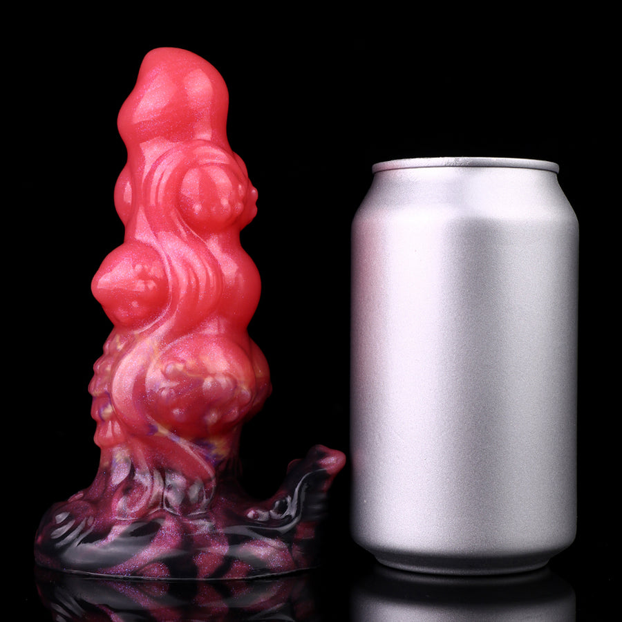 Red alien-shaped anal butt plug with ridged, bulbous detail