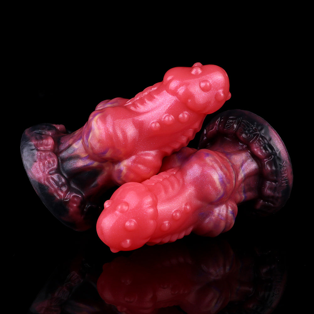 Three-quarter view of wolf butt plug: pink body with purple highlights and dark base