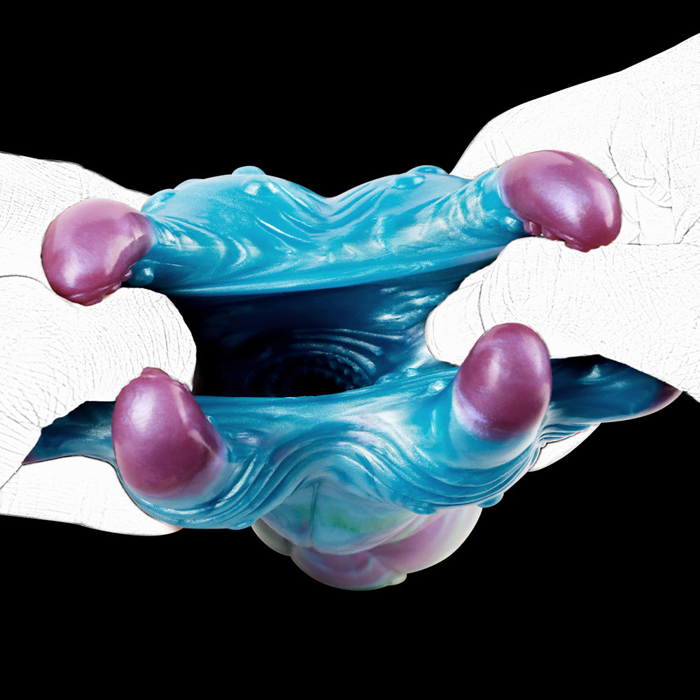Blue tentacle stroker with purple suction bulbs around textured grip